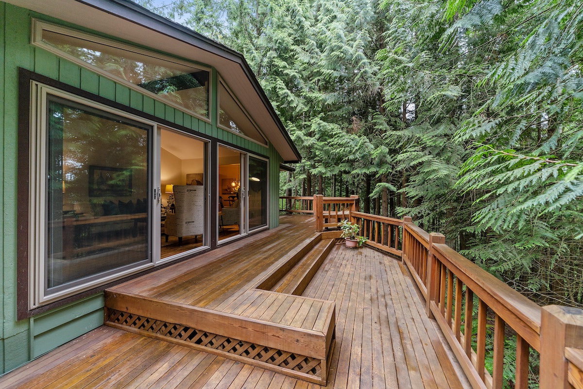 Home in the middle of forest with large deck