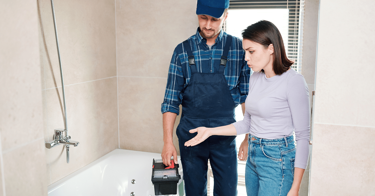 questions-to-ask-contractor Bathroom remodel concept showing transition from renovation blueprint to finished space with modern vanity and custom tile shower