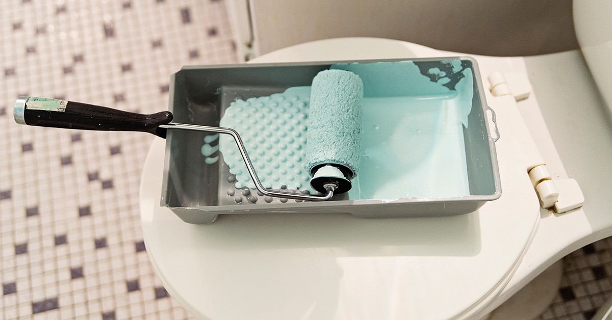 Modern bathroom remodel featuring floating vanity, vessel sink, glass shower, and neutral tile flooring
